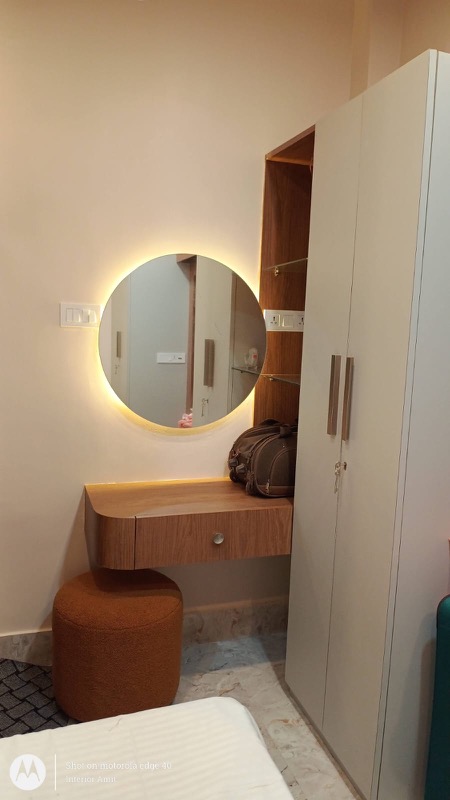 Dressing corner with round backlit mirror and vanity