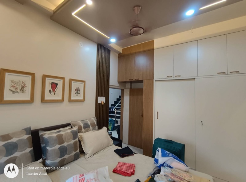 Bedroom storage wall with wardrobe and study ledge