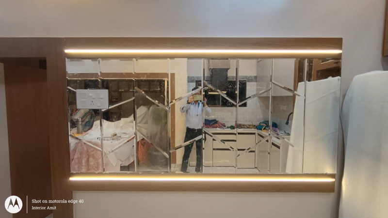 Modern glass partition with framed view into display storage